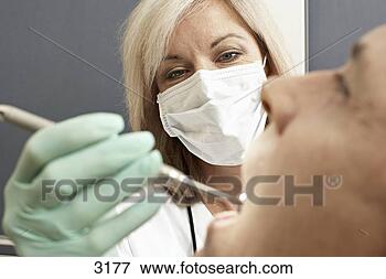 female-dentist-wearing_~3177.jpg